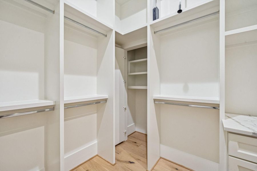 A hidden closet cabinet is in this corner. What will you put in there? A hidden closet cabinet is in this corner. What will you put in there?