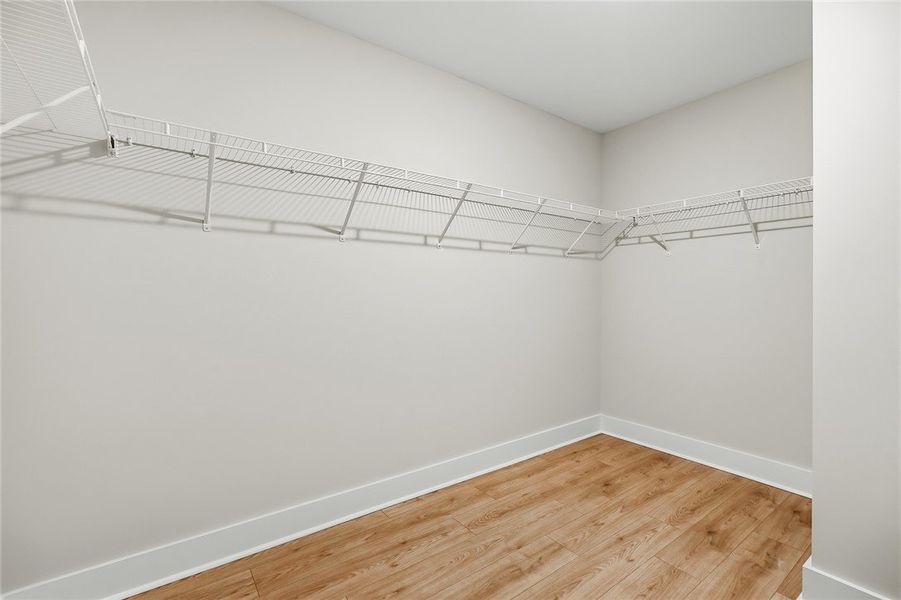 Ample wire shelving lines this walk-in closet feat