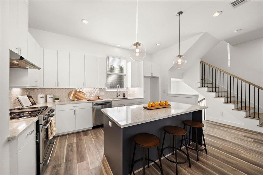 You don’t want to miss the stunning finishes in this modern open floorplan.