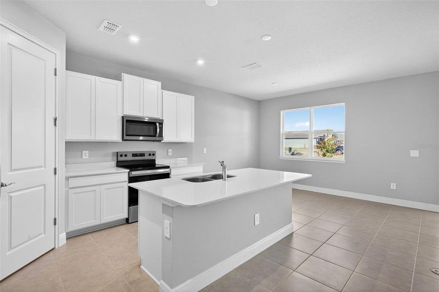 Furnished interior view inside a new home in Windwater, Parrish (Image 9).
