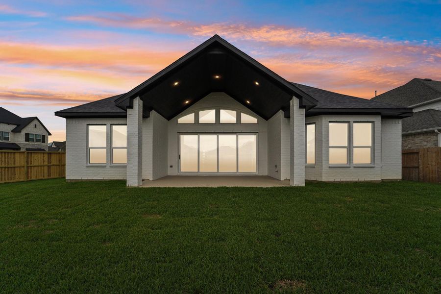 Exterior details and patio area of a home in Sienna 65', Missouri City (Image 3).