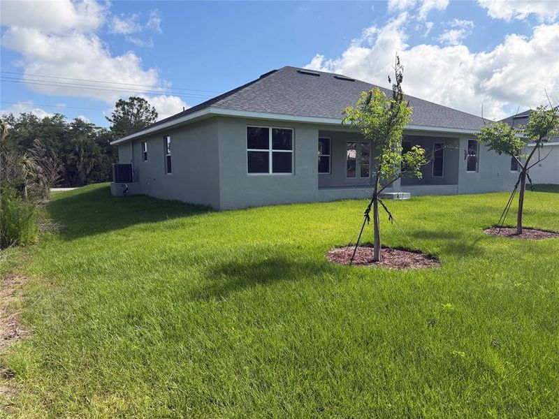 Exterior details and patio area of a home in Port Charlotte, Port Charlotte (Image 4).