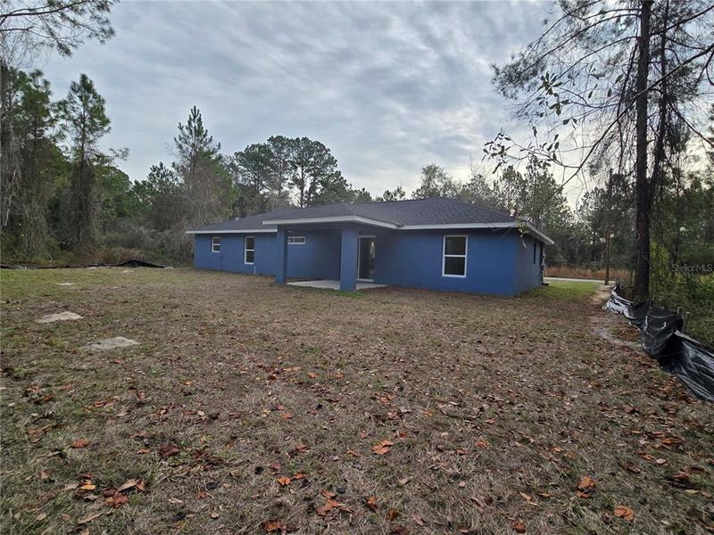 Exterior details and patio area of a home in , Ocklawaha (Image 3).