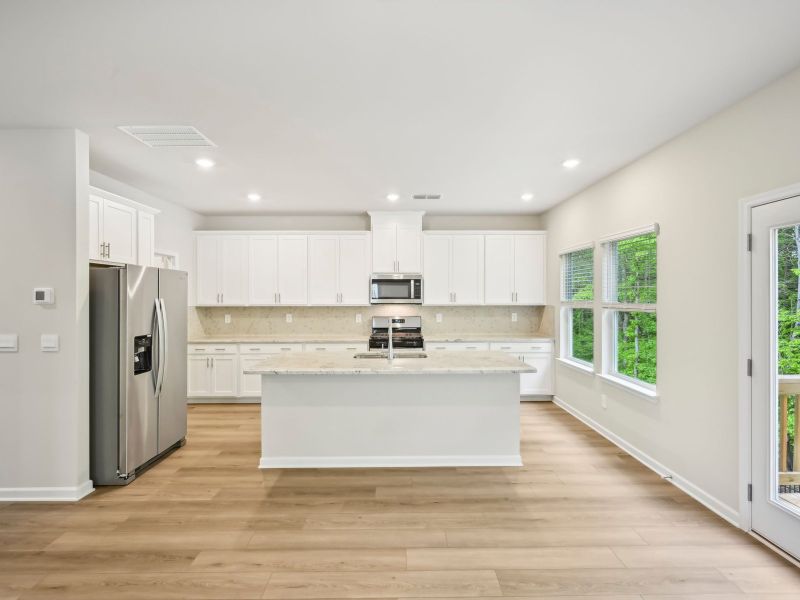 Furnished interior view inside a new home in Martin Springs - Estate Series, Lawrenceville (Image 5).