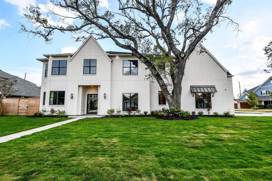 Front exterior of a new home in , Houston, TX, highlighting curb appeal (Image 24).