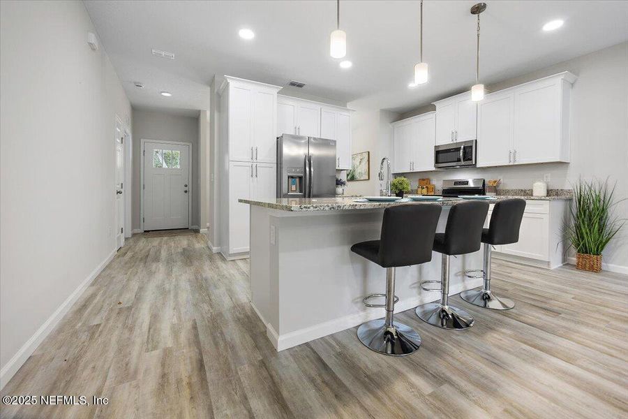 Furnished interior view inside a new home in , Jacksonville (Image 11). Furnished interior view inside a new home in , Jacksonville (Image 11).