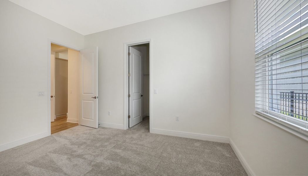 Spacious, unfurnished interior of a new home in Wildleaf at North River Ranch, Parrish (Image 40).