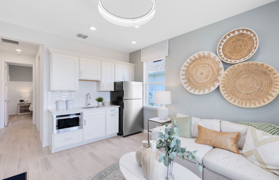 Representative furnished interior of a home built from the Concord by DiVosta in Emerson Oaks, Vero Beach (Image 12).