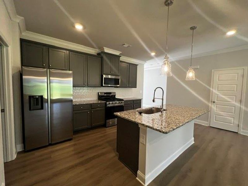 Furnished interior view inside a new home in Crofton Place Enclave, Snellville (Image 5). Furnished interior view inside a new home in Crofton Place Enclave, Snellville (Image 5).