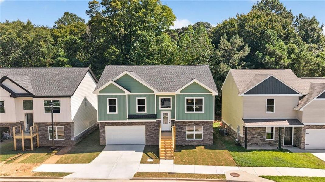 Front exterior of a new home in , Gainesville, GA, highlighting curb appeal (Image 20).