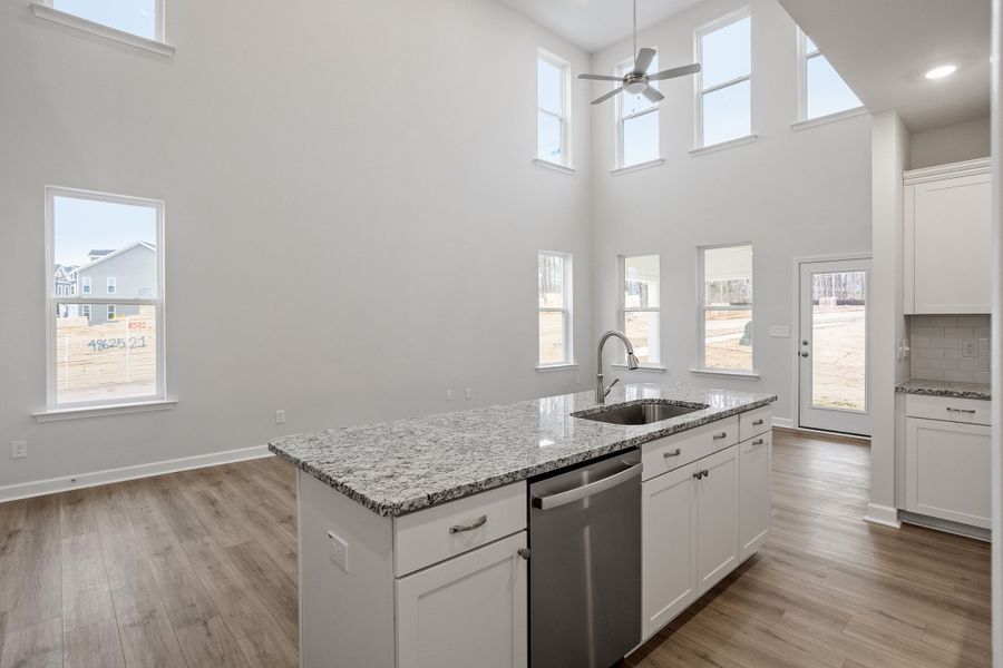 Furnished interior view inside a new home in Ovation at Sweetbrier, Durham (Image 11).