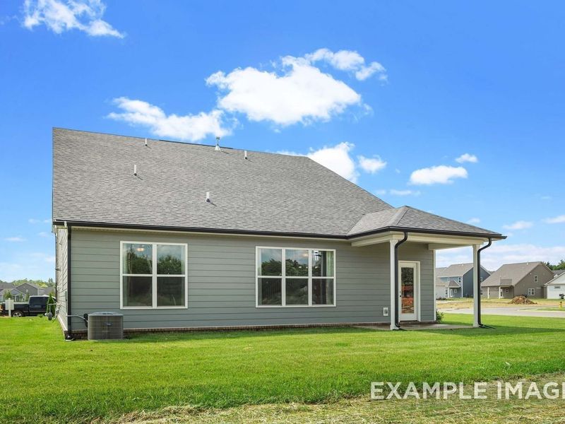 Exterior details and patio area of a home in Woods Crossing, Gallatin (Image 29).