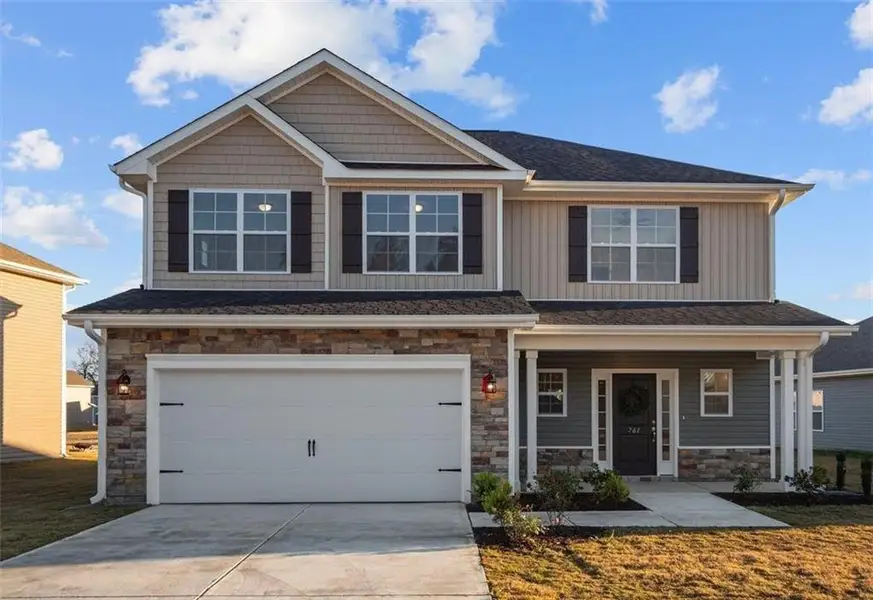 Front exterior of a new home in Habersham Meadows, Demorest, GA, highlighting curb appeal (Image 1). Front exterior of a new home in Habersham Meadows, Demorest, GA, highlighting curb appeal (Image 1).