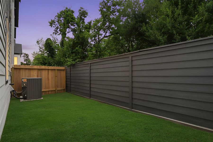 Exterior details and patio area of a home in Highland Commons, Houston (Image 21).