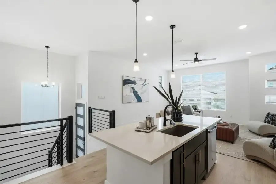 Representative furnished interior of a home built from the Calypso by Chesmar Homes in Centero at Stone Oak, San Antonio (Image 11).