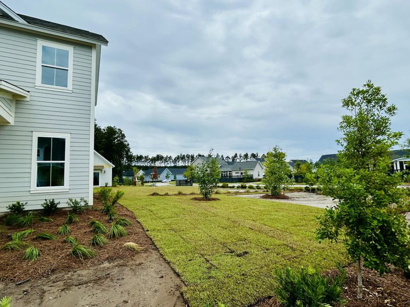 Front exterior of a new home in The Domus Collection at Midtown Nexton, Summerville, SC, highlighting curb appeal (Image 27).
