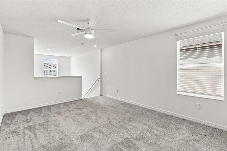 Spacious, unfurnished interior of a new home in The Isle of Avalon, Spring Hill (Image 22).