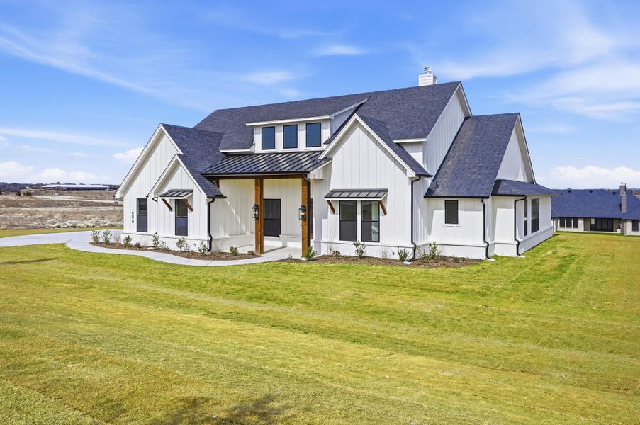 Front exterior of a new home in Aledo Heights - Aledo ISD, Annetta, TX, highlighting curb appeal (Image 26).