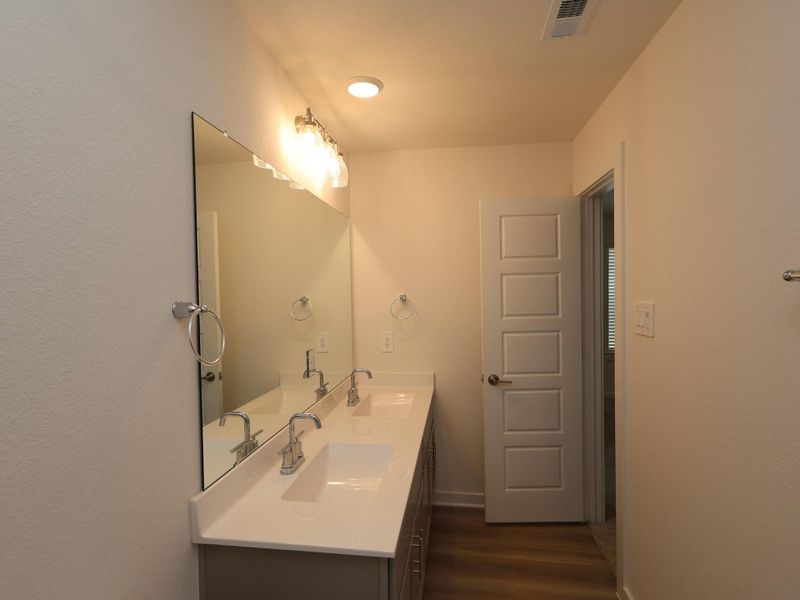 Furnished interior view inside a new home in Sorella, Tomball (Image 11). Furnished interior view inside a new home in Sorella, Tomball (Image 11).