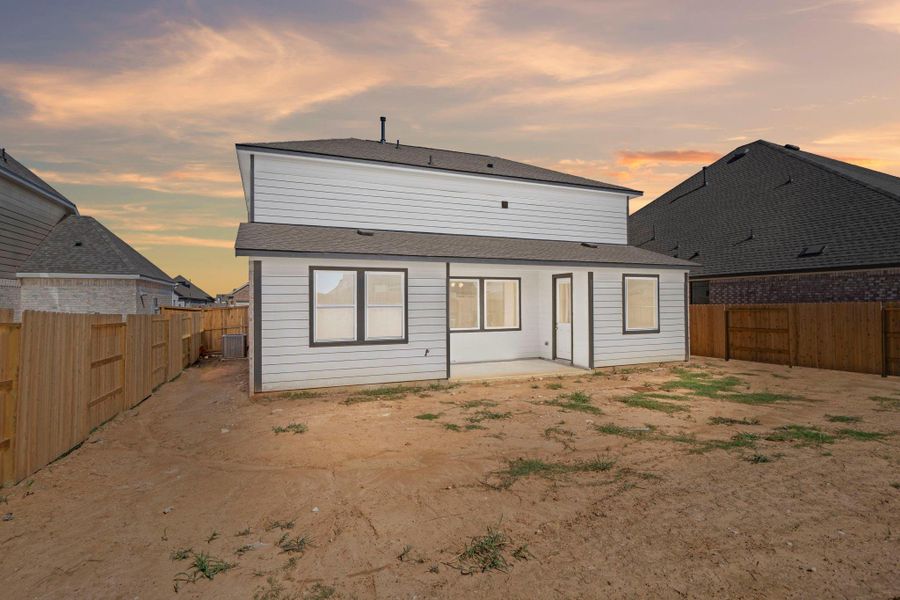 This backyard is perfect for family gatherings, social events, or simply unwinding in the fresh air.