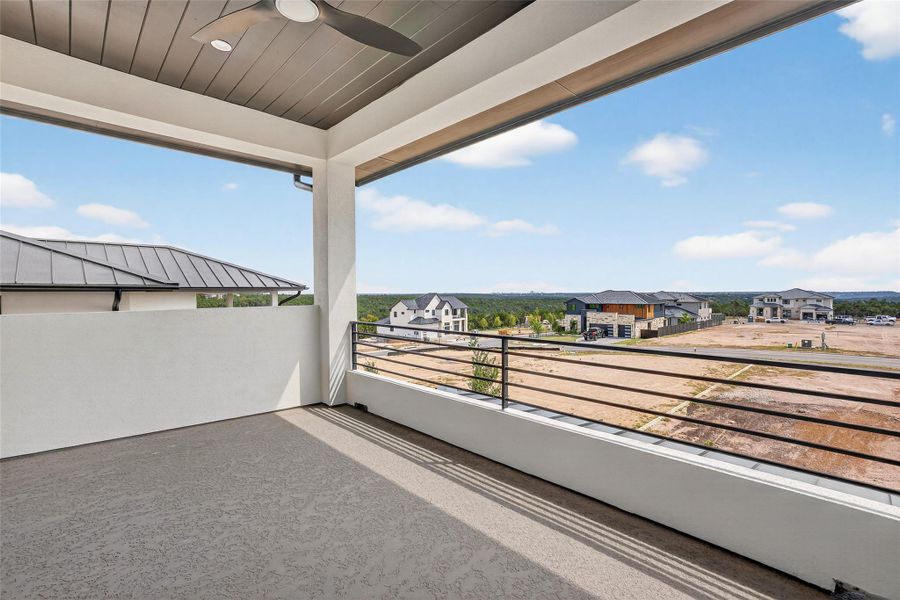 Exterior details and patio area of a home in Milky Way at River Place, Austin (Image 24).