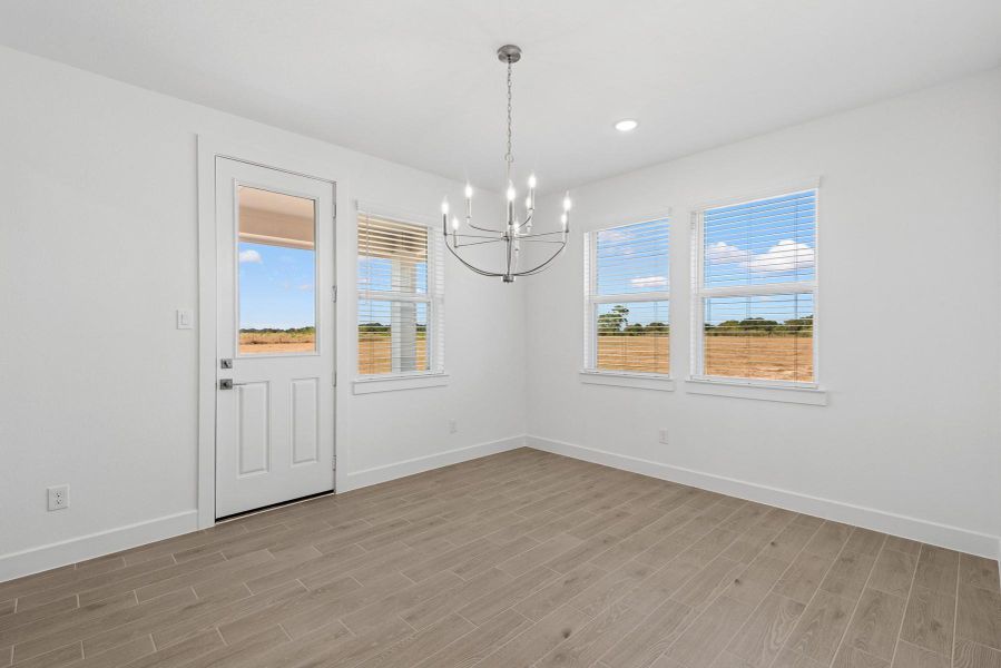 Sun-lit dining area (*Photo not of actual home and used for illustration purposes only.)