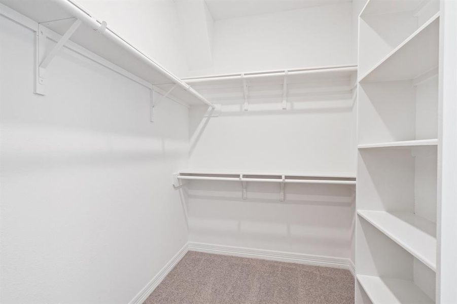 A view of your large primary walk-in Closet