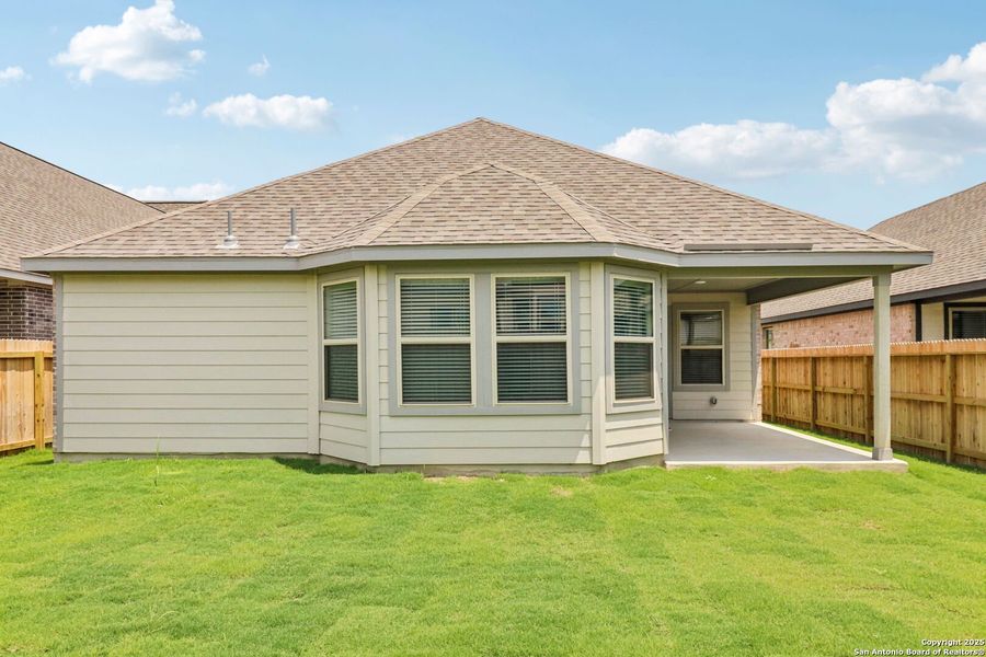 Front exterior of a new home in Kallison Ranch, San Antonio, TX, highlighting curb appeal (Image 28). Front exterior of a new home in Kallison Ranch, San Antonio, TX, highlighting curb appeal (Image 28).