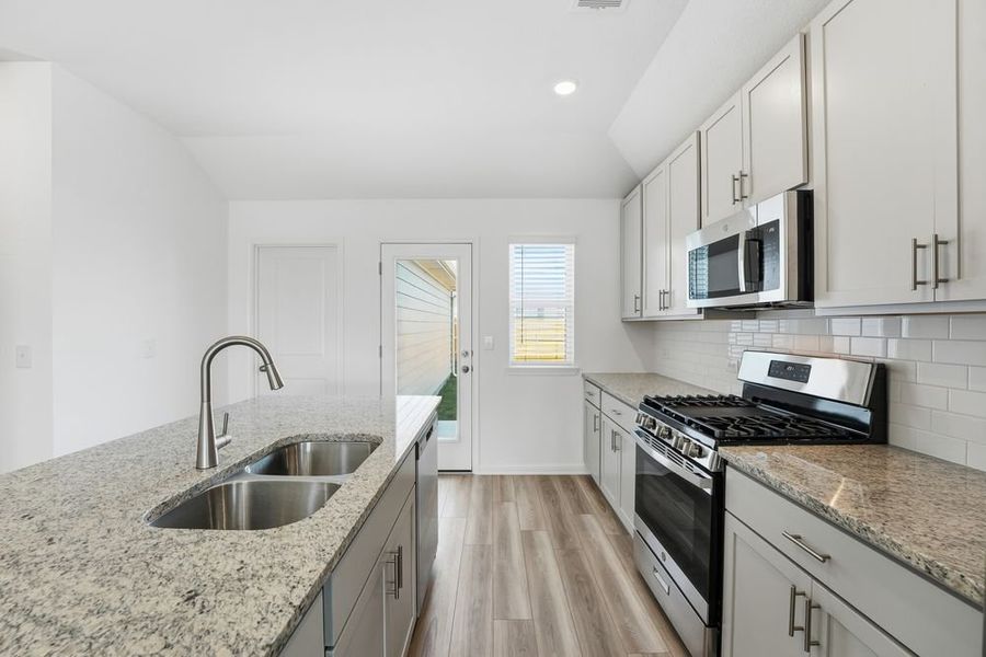 Furnished interior view inside a new home in Longview, Del Valle (Image 6).
