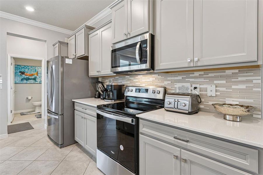 Furnished interior view inside a new home in Windsor Cay Resort, Clermont (Image 7).