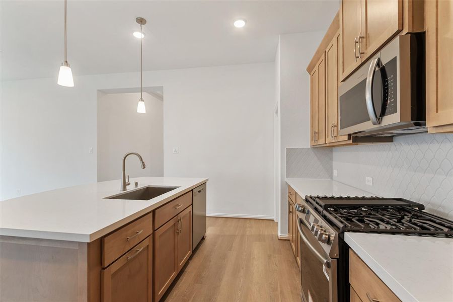 Furnished interior view inside a new home in Sunterra, Katy (Image 5).