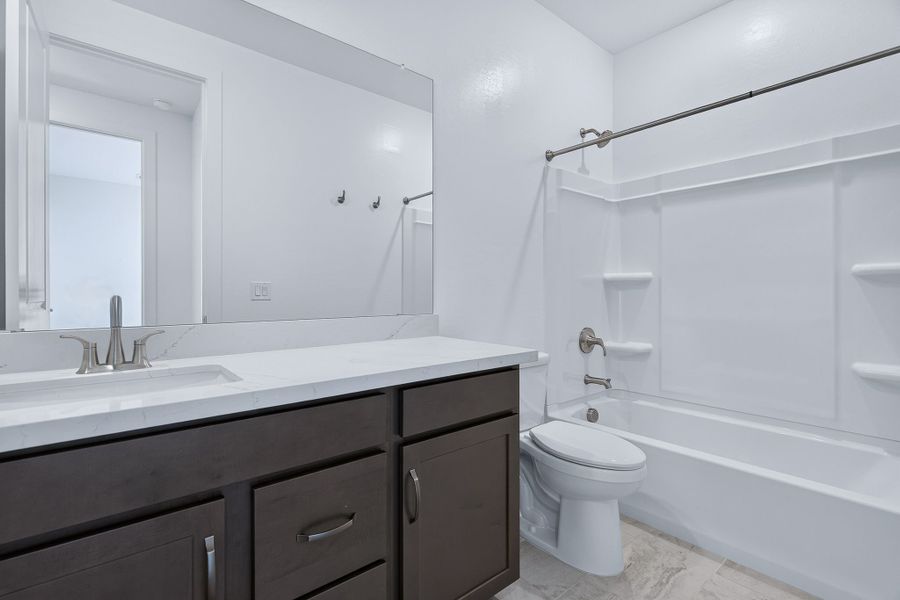 Furnished interior view inside a new home in The Grove at El Cidro, Goodyear (Image 25).