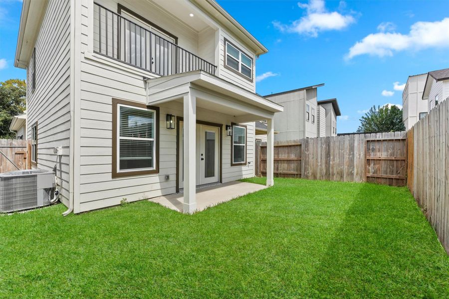 Exterior details and patio area of a home in , Houston (Image 1). Exterior details and patio area of a home in , Houston (Image 1).