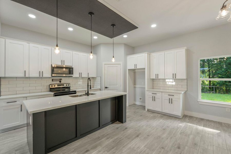 Furnished interior view inside a new home in , Willis (Image 7). Furnished interior view inside a new home in , Willis (Image 7).