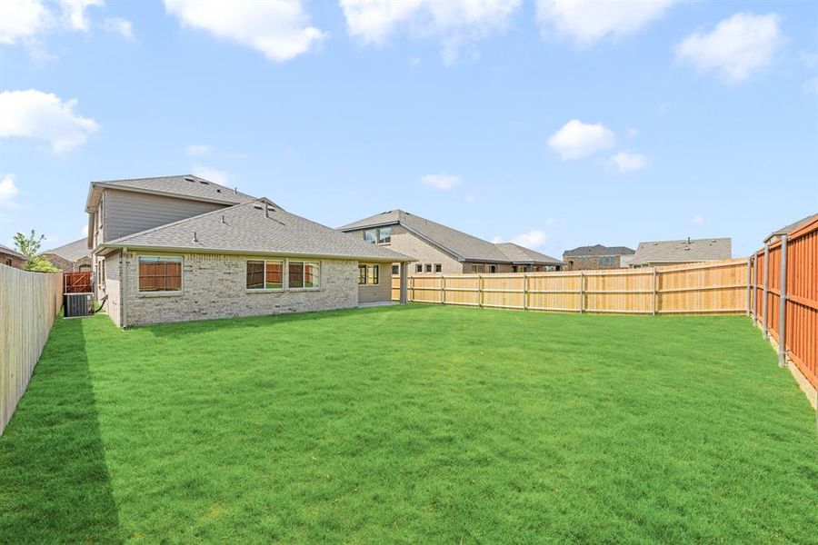 Front exterior of a new home in Heartland Elements, Heartland, TX, highlighting curb appeal (Image 22). Front exterior of a new home in Heartland Elements, Heartland, TX, highlighting curb appeal (Image 22).