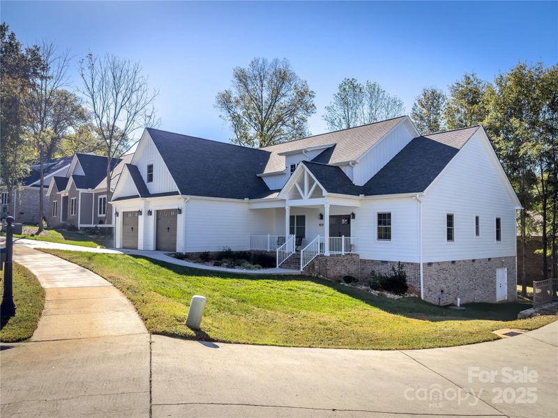 Front exterior of a new home in , Hickory, NC, highlighting curb appeal (Image 25).