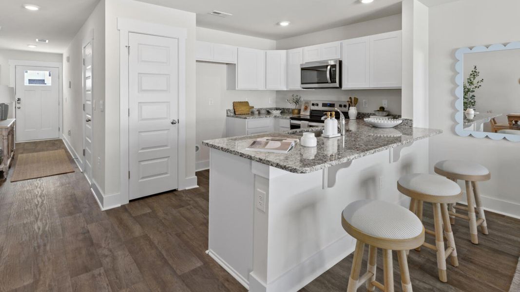 Furnished interior view inside a new home in Waterside Townhomes, Surf City (Image 9).