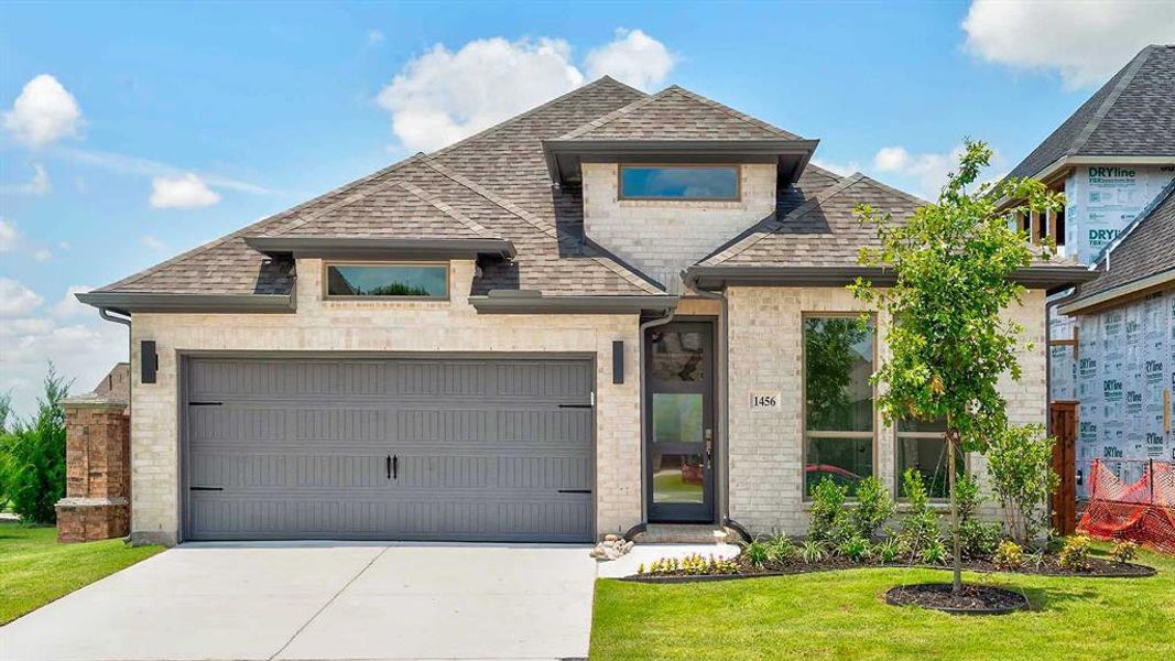 Front exterior of a new home in Devonshire - Reserve 45', Forney, TX, highlighting curb appeal (Image 17).