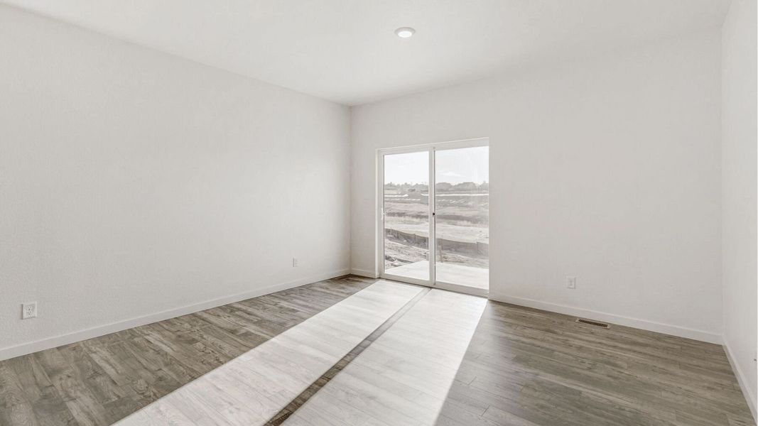 Representative unfurnished interior of a home built from the Elm by D.R. Horton in The Ridge at Lorson Ranch, Colorado Springs (Image 11).