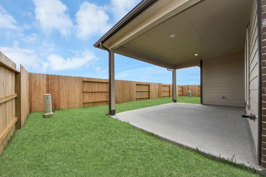 Experience outdoor living at its finest on this expansive covered patio, thoughtfully designed for BBQs and delightful outdoor dining. Experience outdoor living at its finest on this expansive covered patio, thoughtfully designed for BBQs and delightful outdoor dining.