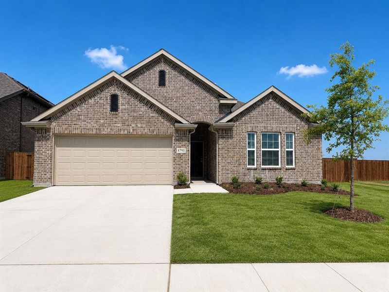 Brick exterior with light mortar, featuring a two-car garage, white window trim, and front landscaping Brick exterior with light mortar, featuring a two-car garage, white window trim, and front landscaping