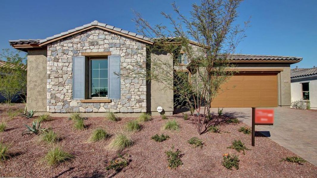 Representative exterior photo of a completed home built from the Shire by Taylor Morrison in Victory at Verrado Venture II Collection 55+, Buckeye, AZ (Image 22).