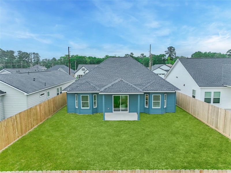 Exterior details and patio area of a home in , Splendora (Image 24).