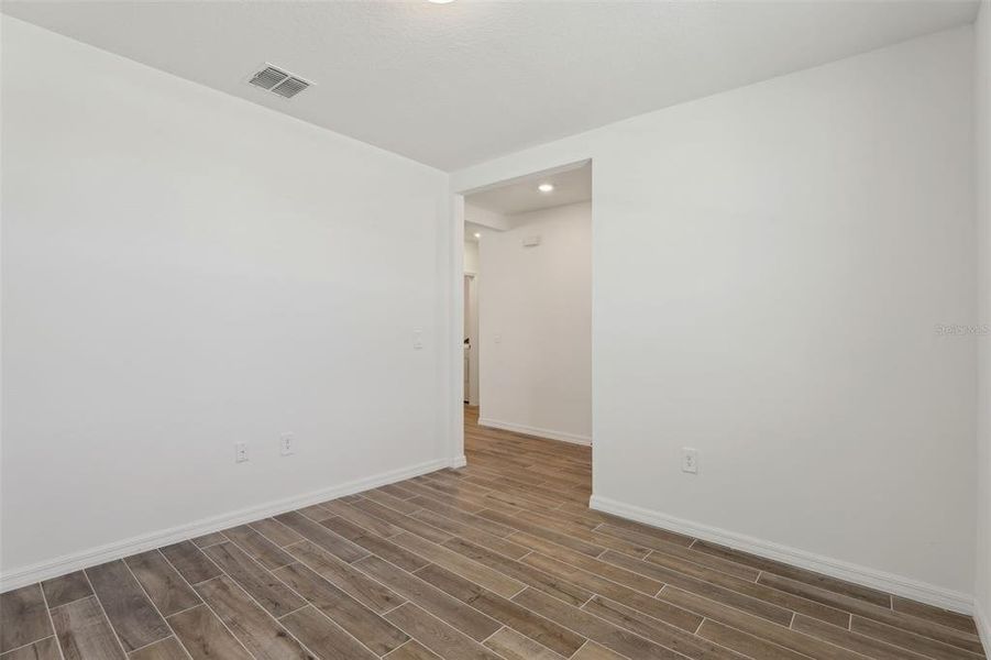 Spacious, unfurnished interior of a new home in Lawson Dunes - Signature Series, Haines City (Image 23).