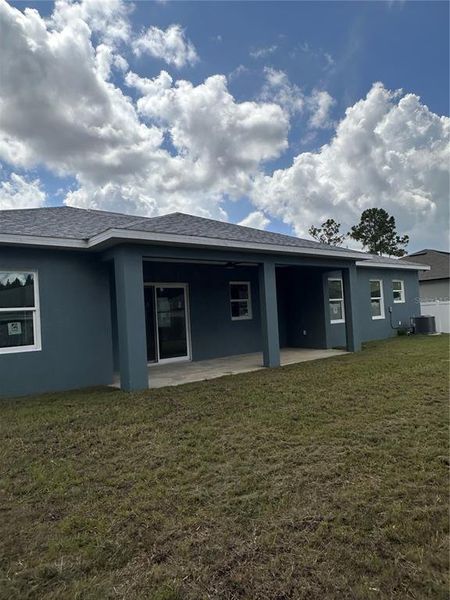 Front exterior of a new home in , Palm Bay, FL, highlighting curb appeal (Image 26). Front exterior of a new home in , Palm Bay, FL, highlighting curb appeal (Image 26).