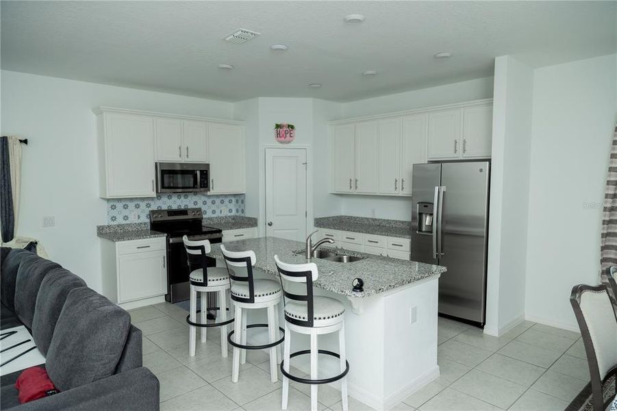 Furnished interior view inside a new home in Village at Windsor Reserve, Eagle Lake (Image 17). Furnished interior view inside a new home in Village at Windsor Reserve, Eagle Lake (Image 17).