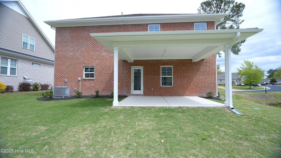 Front exterior of a new home in Palmetto Creek, Bolivia, NC, highlighting curb appeal (Image 19).