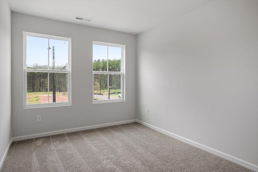 Spacious, unfurnished interior of a new home in Sweetbrier, Durham (Image 24).
