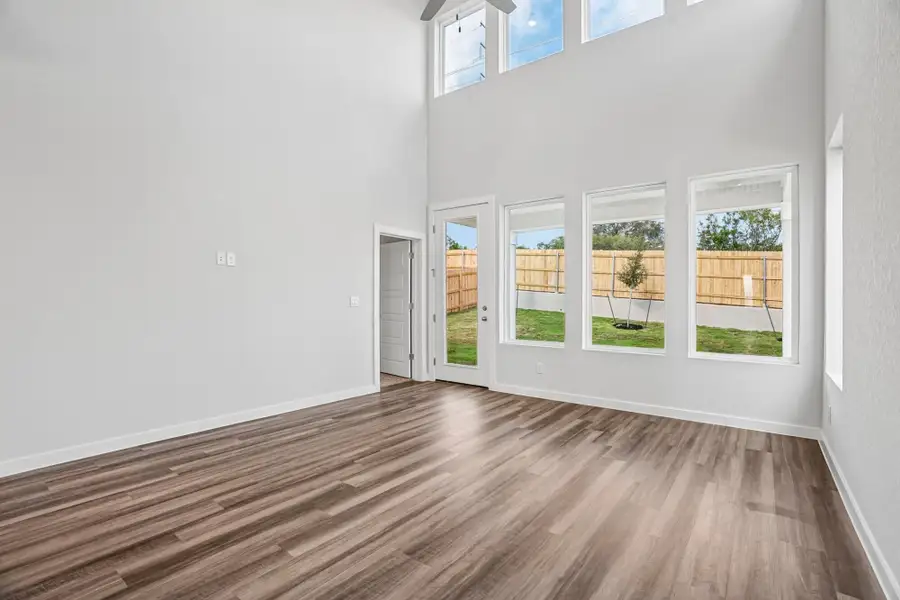 Spacious, unfurnished interior of a new home in The Meadows at Hunters Ranch, San Antonio (Image 13).