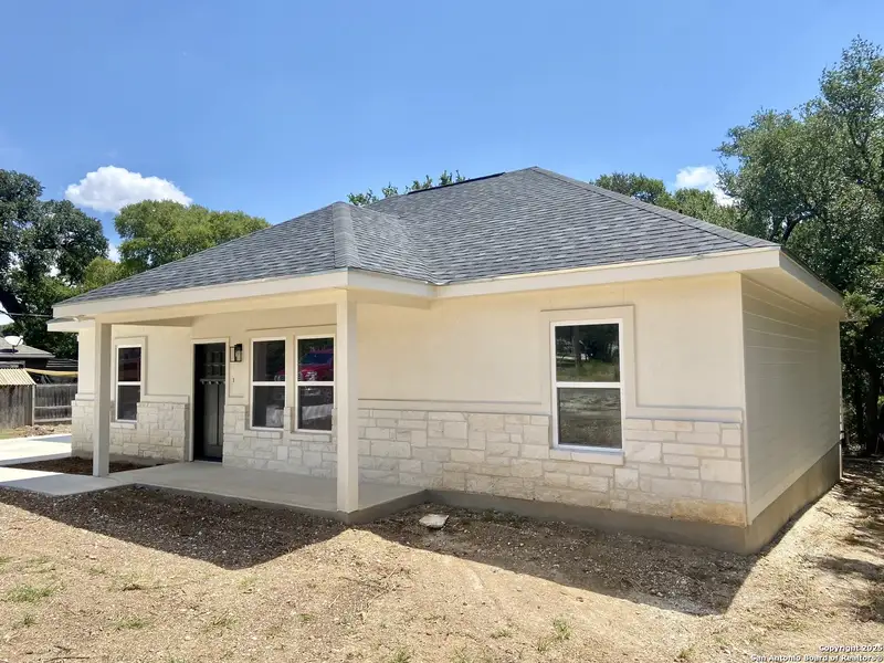 Front exterior of a new home in , Canyon Lake, TX, highlighting curb appeal (Image 10). Front exterior of a new home in , Canyon Lake, TX, highlighting curb appeal (Image 10).